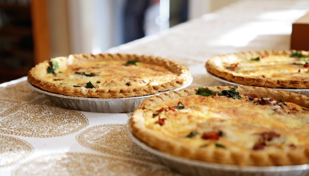 Three quiches on a table.