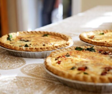 Three quiches on a table.
